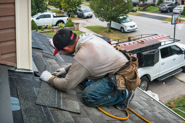 Professional Roof Replacement technician working in May, ID